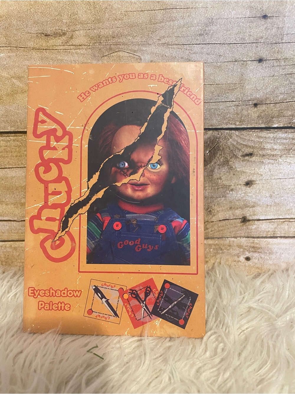 Child's Play Chucky eyeshadow palette features a torn "Good Guys" doll